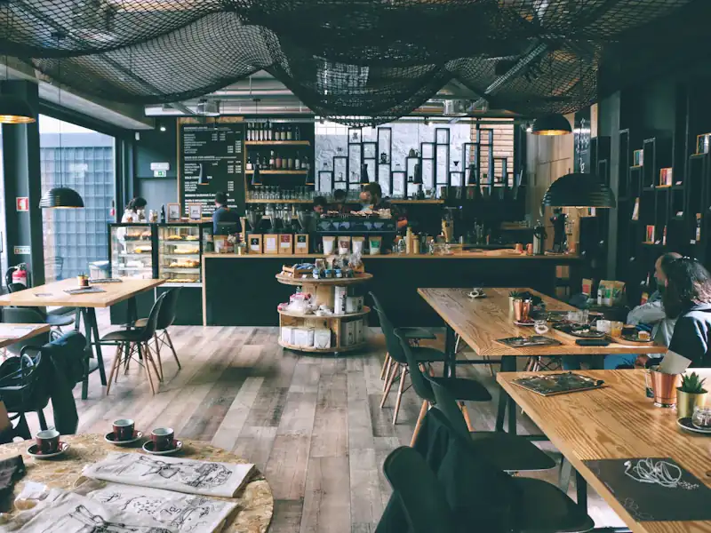 A sunlit café table prepared for a calm conversation