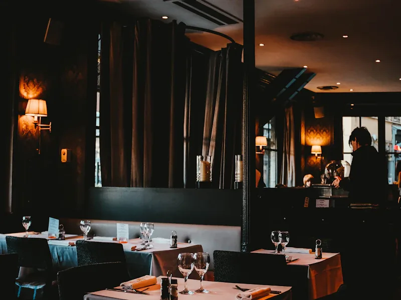 A softly lit restaurant dining room suited to an intimate conversation