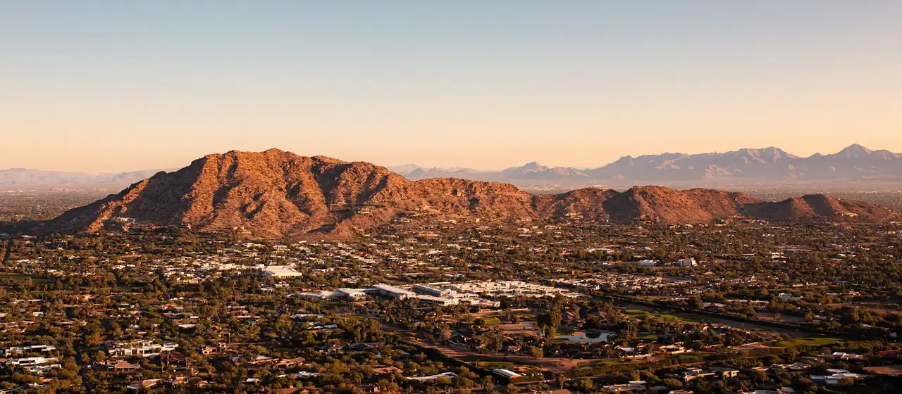 Aerial view of Tempe, Arizona with mountains in the background